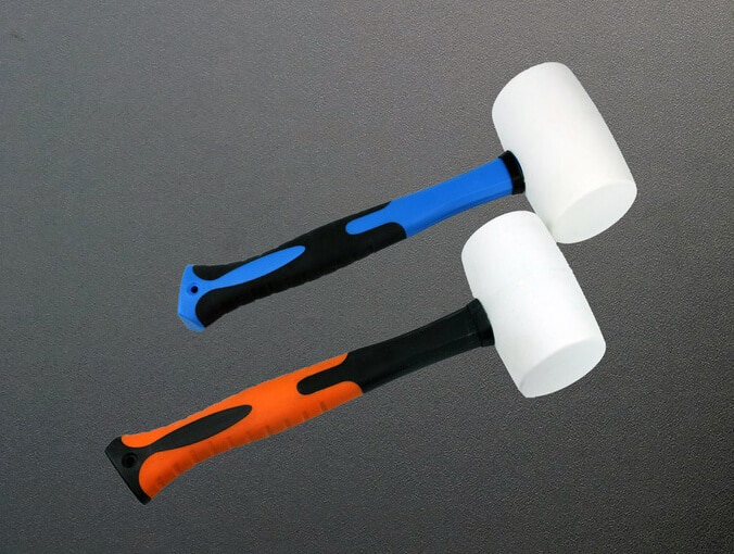 Two rubber hammers