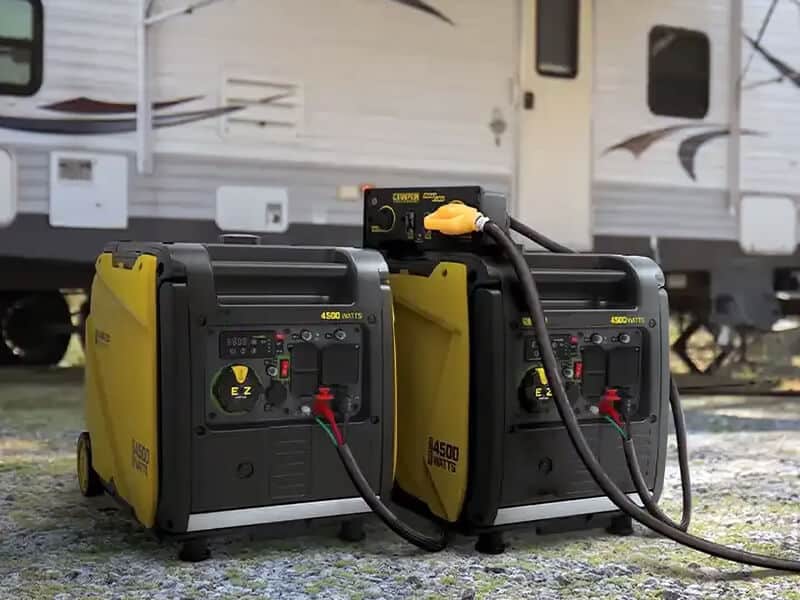 Inverter generator placed on the side of the caravan